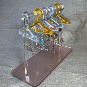 Acrylic jewelry hangers and “clothing line” earring display